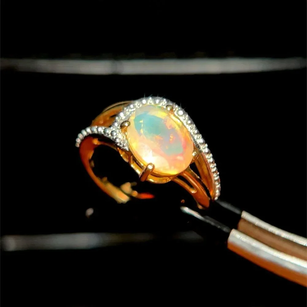 10K‎ Oval Shaped Opal/Diamonds Ring